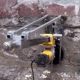 Concrete core cutter in the wall